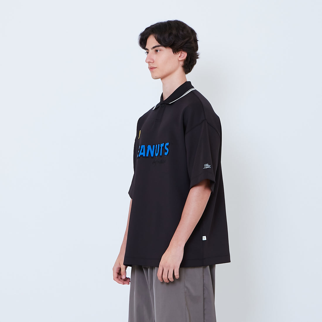 Peanuts Gender Neutral Printed Oversized Jersey Polo Tee - Black - PU2605004B